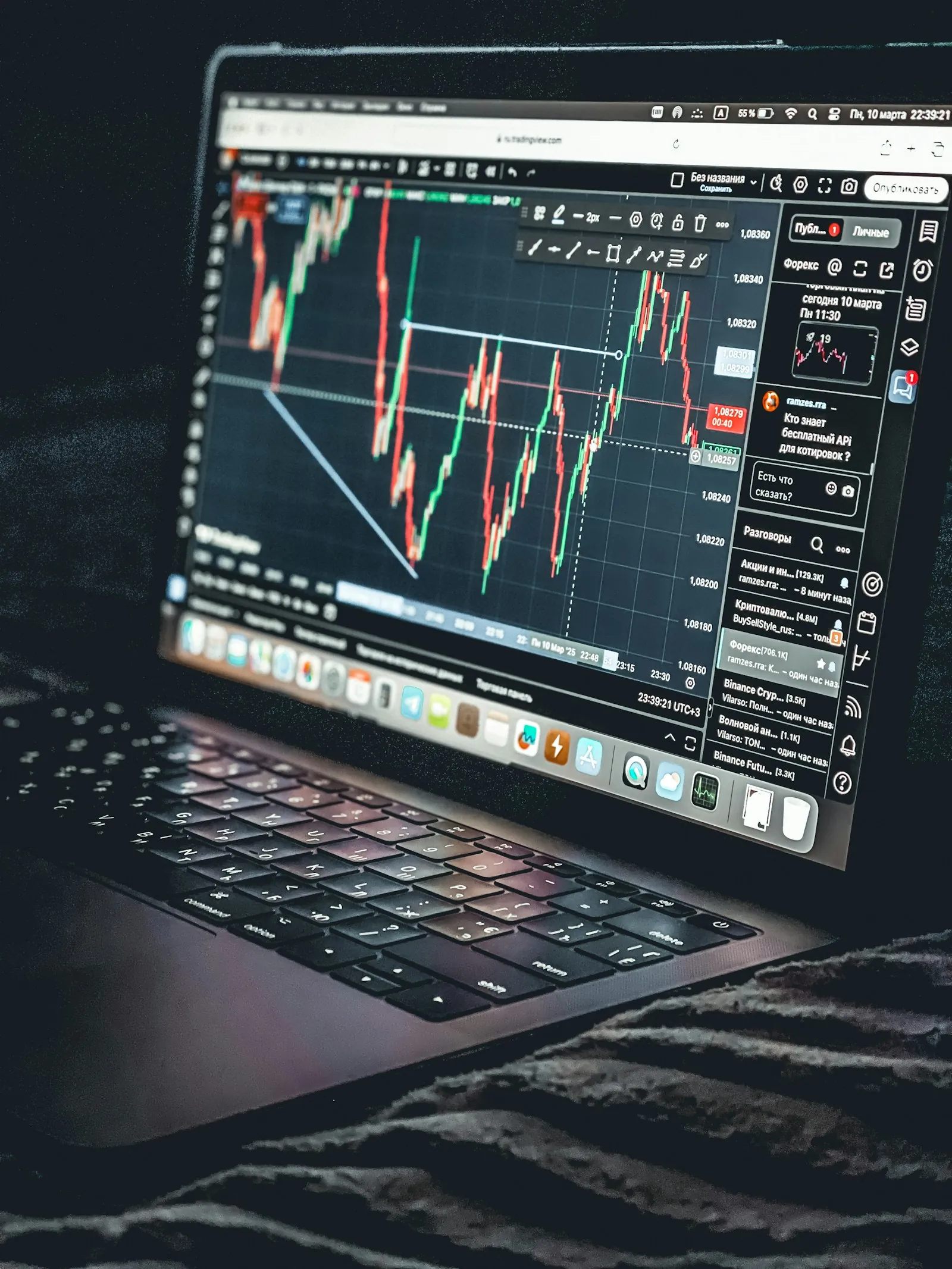 A laptop screen showing an investment chart